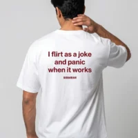 DOBARAA – "Flirt & Panic" Oversized Quote Tee